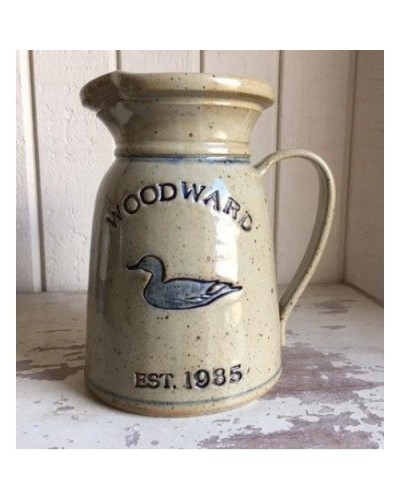 Pitcher with Duck logo